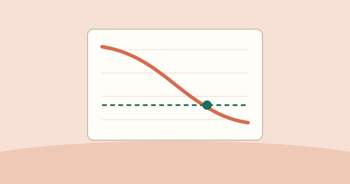 Illustration: a chart line falling to a dashed target line